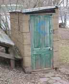 The Classic - Tarpaper siding with nice weathered door.